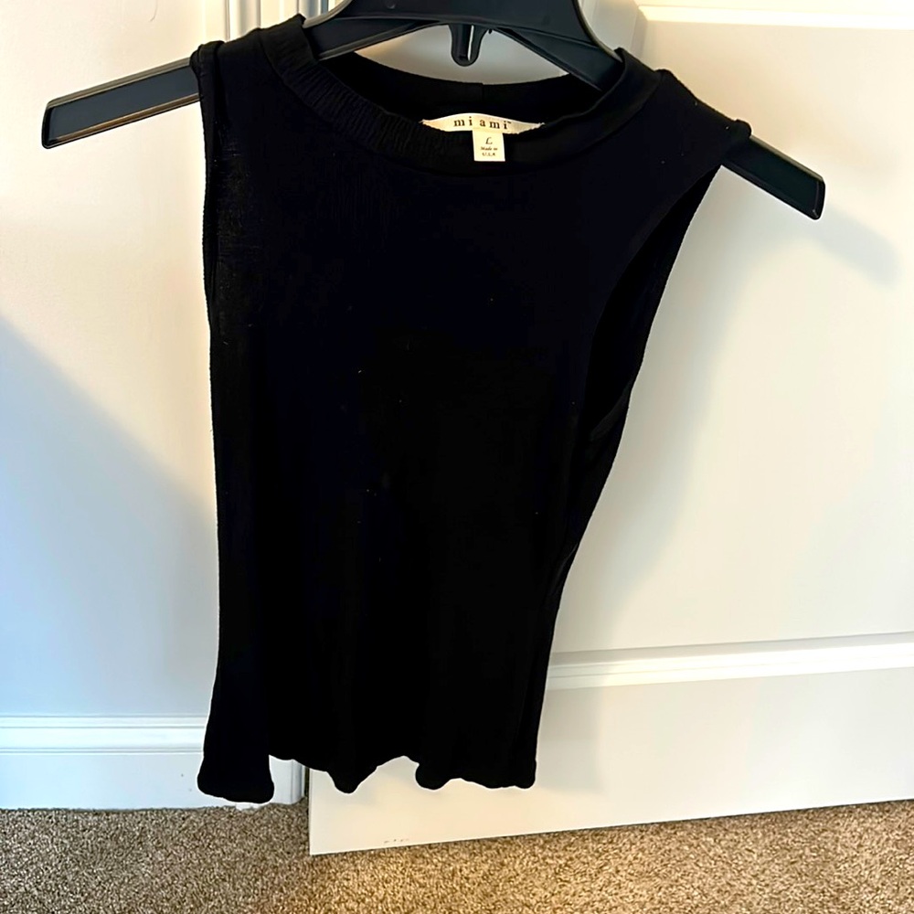 Francesca’s black ribbed tank